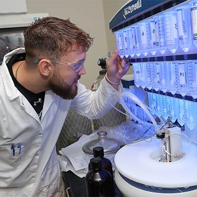 a students works with medical equipment